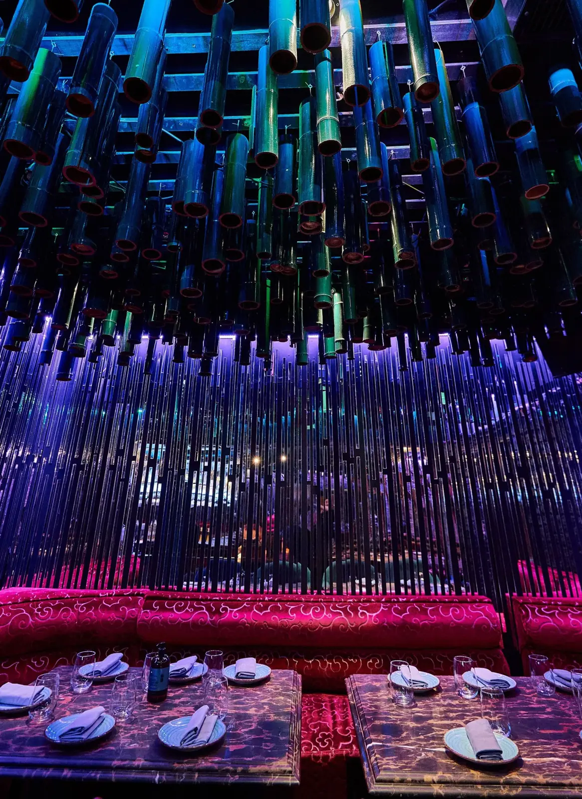 Bamboo ceiling glowing teal and violet