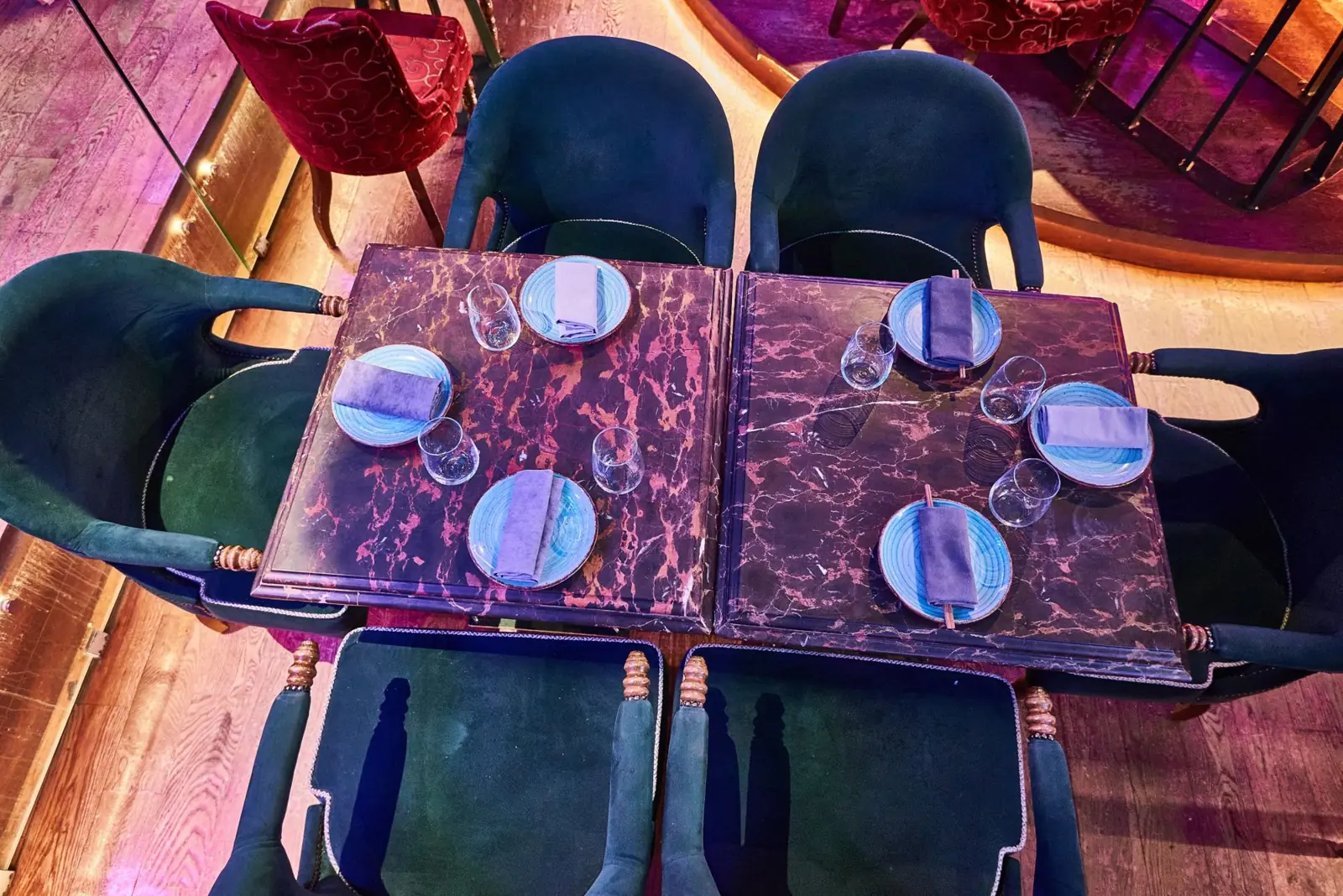 Overhead view of tables set with celadon plates